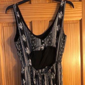 Black and white jumpsuit with open back